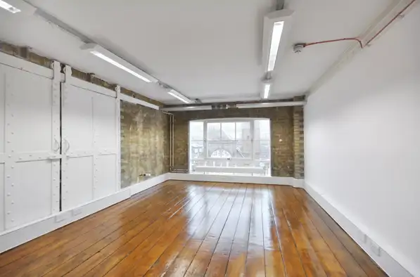 Office space to rent at Clerkenwell Workshops, 27/31 Clerkenwell Close, Farringdon, London, EC1R 0AT, unit CS.409, 303 sq ft (28 sq m)